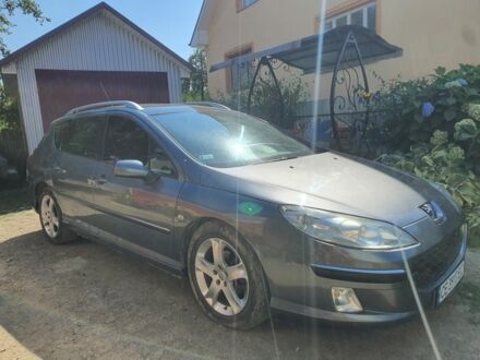 Серый Пежо 407, объемом двигателя 2 л и пробегом 216 тыс. км за 2000 $, фото 1 на Automoto.ua