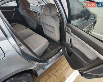 Синій Пежо 407, об'ємом двигуна 2 л та пробігом 255 тис. км за 3850 $, фото 11 на Automoto.ua