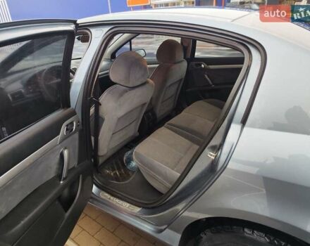 Синій Пежо 407, об'ємом двигуна 2 л та пробігом 255 тис. км за 3850 $, фото 12 на Automoto.ua