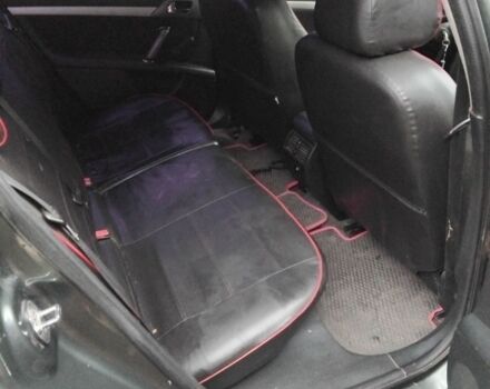 Зеленый Пежо 407, объемом двигателя 1.7 л и пробегом 356 тыс. км за 4600 $, фото 5 на Automoto.ua