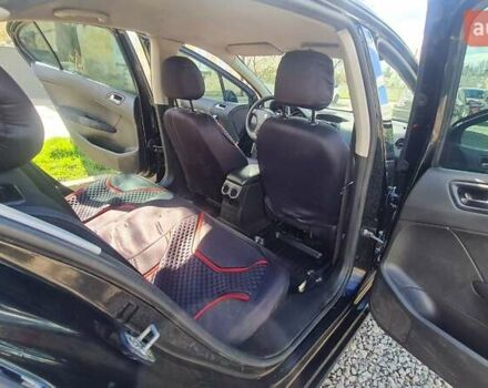 Пежо 408 2013 в Львове на Automoto.ua Черный Пежо 408, объемом двигателя 1.56 л и пробегом 309 тыс. км за 5550 $, фото 9 на Automoto.ua