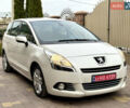 Белый Пежо 5008, объемом двигателя 2 л и пробегом 210 тыс. км за 10848 $, фото 1 на Automoto.ua