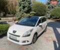 Белый Пежо 5008, объемом двигателя 1.56 л и пробегом 218 тыс. км за 9700 $, фото 1 на Automoto.ua