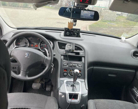 Белый Пежо 5008, объемом двигателя 1.56 л и пробегом 306 тыс. км за 8850 $, фото 8 на Automoto.ua