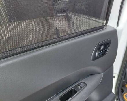 Белый Пежо 5008, объемом двигателя 1.56 л и пробегом 239 тыс. км за 6900 $, фото 4 на Automoto.ua