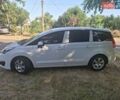 Белый Пежо 5008, объемом двигателя 1.56 л и пробегом 181 тыс. км за 9300 $, фото 1 на Automoto.ua