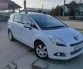 Белый Пежо 5008, объемом двигателя 1.6 л и пробегом 285 тыс. км за 7000 $, фото 1 на Automoto.ua