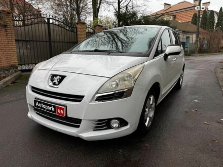 Белый Пежо 5008, объемом двигателя 1.6 л и пробегом 272 тыс. км за 8490 $, фото 1 на Automoto.ua