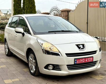 Белый Пежо 5008, объемом двигателя 2 л и пробегом 210 тыс. км за 10848 $, фото 1 на Automoto.ua