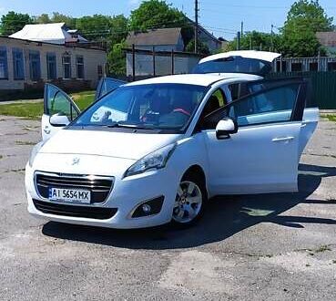 Белый Пежо 5008, объемом двигателя 1.6 л и пробегом 190 тыс. км за 12200 $, фото 1 на Automoto.ua