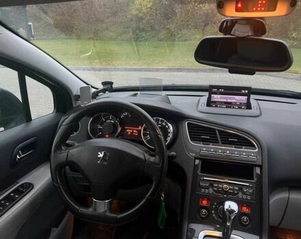 Черный Пежо 5008, объемом двигателя 2 л и пробегом 245 тыс. км за 7739 $, фото 14 на Automoto.ua