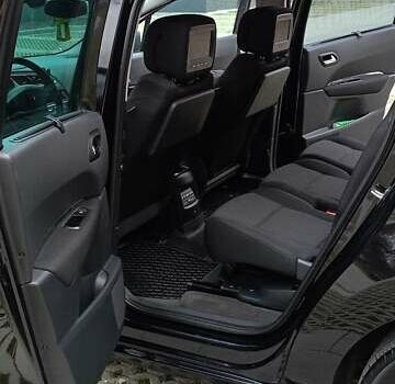 Черный Пежо 5008, объемом двигателя 1.56 л и пробегом 304 тыс. км за 8400 $, фото 18 на Automoto.ua