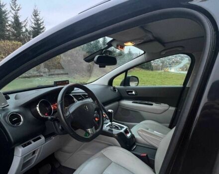 Черный Пежо 5008, объемом двигателя 2 л и пробегом 245 тыс. км за 7739 $, фото 16 на Automoto.ua