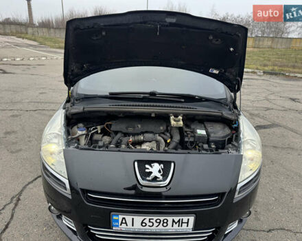Черный Пежо 5008, объемом двигателя 1.56 л и пробегом 356 тыс. км за 8199 $, фото 16 на Automoto.ua