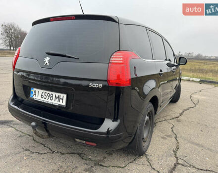 Черный Пежо 5008, объемом двигателя 1.56 л и пробегом 356 тыс. км за 8199 $, фото 4 на Automoto.ua
