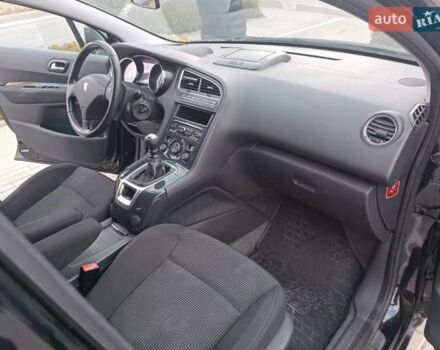 Черный Пежо 5008, объемом двигателя 2 л и пробегом 254 тыс. км за 9600 $, фото 14 на Automoto.ua