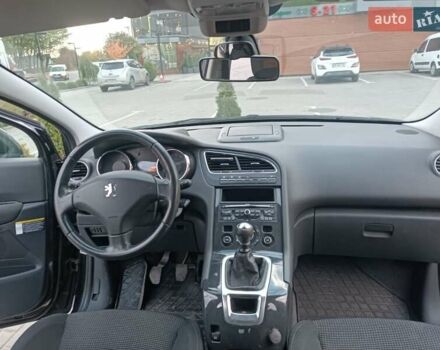 Черный Пежо 5008, объемом двигателя 2 л и пробегом 254 тыс. км за 9600 $, фото 12 на Automoto.ua
