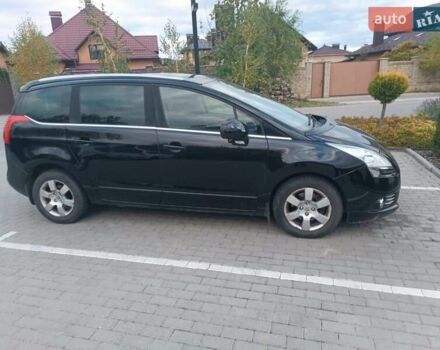 Черный Пежо 5008, объемом двигателя 2 л и пробегом 254 тыс. км за 9600 $, фото 16 на Automoto.ua