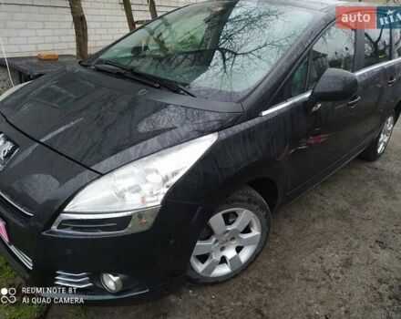 Черный Пежо 5008, объемом двигателя 1.6 л и пробегом 235 тыс. км за 8950 $, фото 11 на Automoto.ua