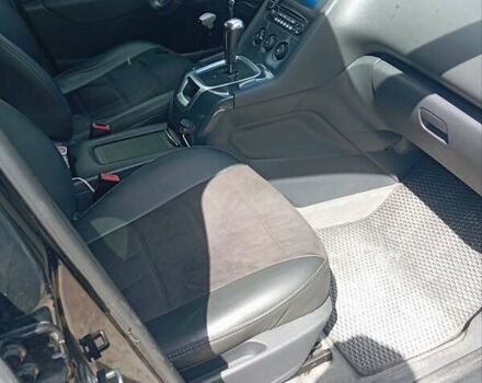 Черный Пежо 5008, объемом двигателя 1.6 л и пробегом 251 тыс. км за 8500 $, фото 1 на Automoto.ua