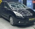 Черный Пежо 5008, объемом двигателя 1.6 л и пробегом 177 тыс. км за 8350 $, фото 1 на Automoto.ua