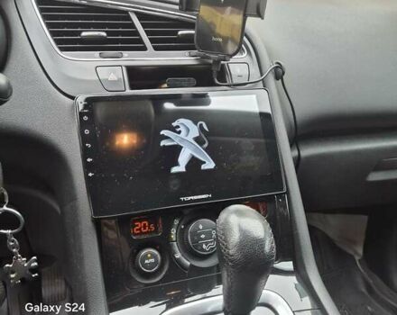 Черный Пежо 5008, объемом двигателя 2 л и пробегом 240 тыс. км за 11500 $, фото 8 на Automoto.ua