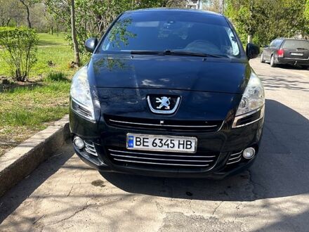 Черный Пежо 5008, объемом двигателя 1.6 л и пробегом 287 тыс. км за 8200 $, фото 1 на Automoto.ua