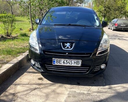 Черный Пежо 5008, объемом двигателя 1.6 л и пробегом 287 тыс. км за 8200 $, фото 1 на Automoto.ua