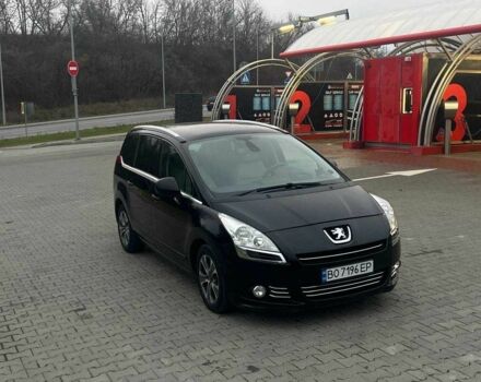 Черный Пежо 5008, объемом двигателя 2 л и пробегом 245 тыс. км за 7739 $, фото 1 на Automoto.ua