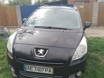 Черный Пежо 5008, объемом двигателя 1.6 л и пробегом 240 тыс. км за 8500 $, фото 1 на Automoto.ua