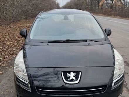 Черный Пежо 5008, объемом двигателя 1.6 л и пробегом 230 тыс. км за 7200 $, фото 1 на Automoto.ua