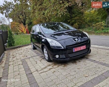 Черный Пежо 5008, объемом двигателя 1.6 л и пробегом 190 тыс. км за 9900 $, фото 1 на Automoto.ua