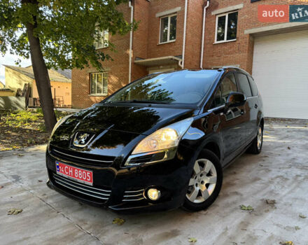 Черный Пежо 5008, объемом двигателя 1.6 л и пробегом 203 тыс. км за 9900 $, фото 1 на Automoto.ua
