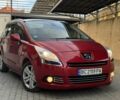 Красный Пежо 5008, объемом двигателя 2 л и пробегом 315 тыс. км за 8500 $, фото 1 на Automoto.ua