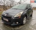 Серый Пежо 5008, объемом двигателя 1.56 л и пробегом 210 тыс. км за 8900 $, фото 1 на Automoto.ua