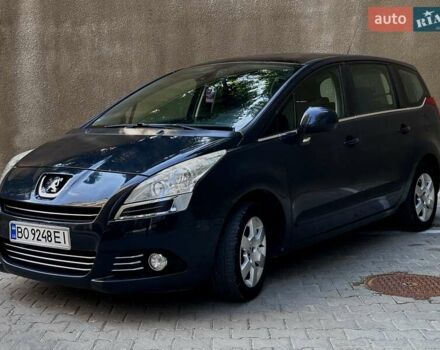 Серый Пежо 5008, объемом двигателя 1.6 л и пробегом 222 тыс. км за 7800 $, фото 1 на Automoto.ua