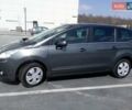 Серый Пежо 5008, объемом двигателя 1.6 л и пробегом 244 тыс. км за 6500 $, фото 1 на Automoto.ua