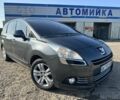 Сірий Пежо 5008, об'ємом двигуна 1.6 л та пробігом 265 тис. км за 7600 $, фото 1 на Automoto.ua
