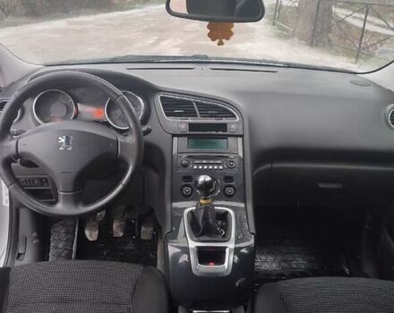Серый Пежо 5008, объемом двигателя 1.6 л и пробегом 280 тыс. км за 6990 $, фото 13 на Automoto.ua
