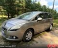 Серый Пежо 5008, объемом двигателя 1.6 л и пробегом 227 тыс. км за 5950 $, фото 1 на Automoto.ua