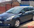 Серый Пежо 5008, объемом двигателя 1.6 л и пробегом 290 тыс. км за 8300 $, фото 1 на Automoto.ua