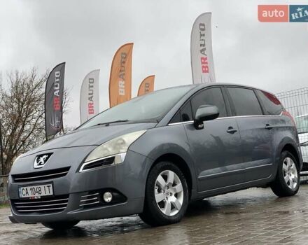 Серый Пежо 5008, объемом двигателя 1.6 л и пробегом 276 тыс. км за 7999 $, фото 1 на Automoto.ua