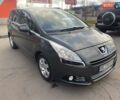 Серый Пежо 5008, объемом двигателя 1.6 л и пробегом 250 тыс. км за 6600 $, фото 2 на Automoto.ua