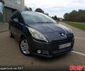 Серый Пежо 5008, объемом двигателя 1.6 л и пробегом 188 тыс. км за 7800 $, фото 1 на Automoto.ua
