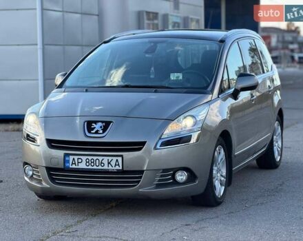 Серый Пежо 5008, объемом двигателя 1.6 л и пробегом 264 тыс. км за 8700 $, фото 1 на Automoto.ua