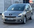Серый Пежо 5008, объемом двигателя 1.6 л и пробегом 264 тыс. км за 8700 $, фото 1 на Automoto.ua