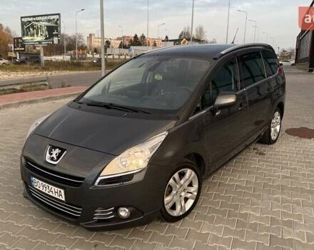 Серый Пежо 5008, объемом двигателя 2 л и пробегом 211 тыс. км за 10699 $, фото 1 на Automoto.ua