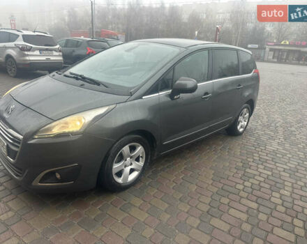 Серый Пежо 5008, объемом двигателя 1.6 л и пробегом 260 тыс. км за 10777 $, фото 1 на Automoto.ua