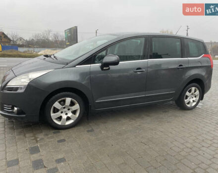 Серый Пежо 5008, объемом двигателя 1.6 л и пробегом 272 тыс. км за 7800 $, фото 1 на Automoto.ua