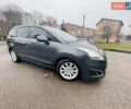 Серый Пежо 5008, объемом двигателя 1.6 л и пробегом 255 тыс. км за 8200 $, фото 1 на Automoto.ua